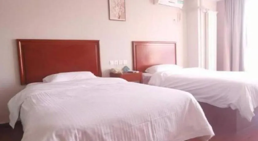 Bed in GreenTree Inn Tianjin JinNan ShuangLin Metro Station Express Hotel