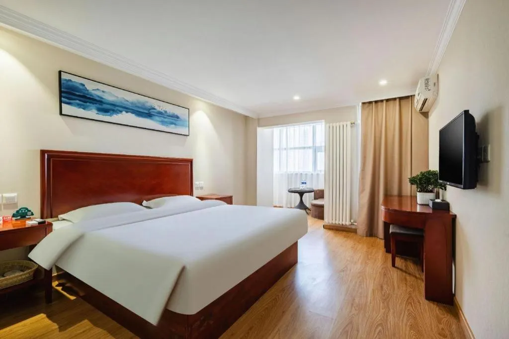 Bed in GreenTree Inn Tianjin JinNan ShuangLin Metro Station Express Hotel