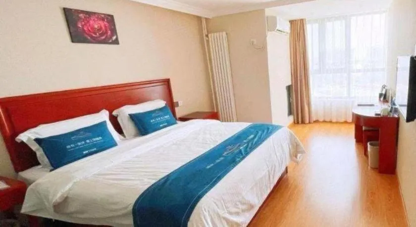 Bed in GreenTree Inn Tianjin JinNan ShuangLin Metro Station Express Hotel