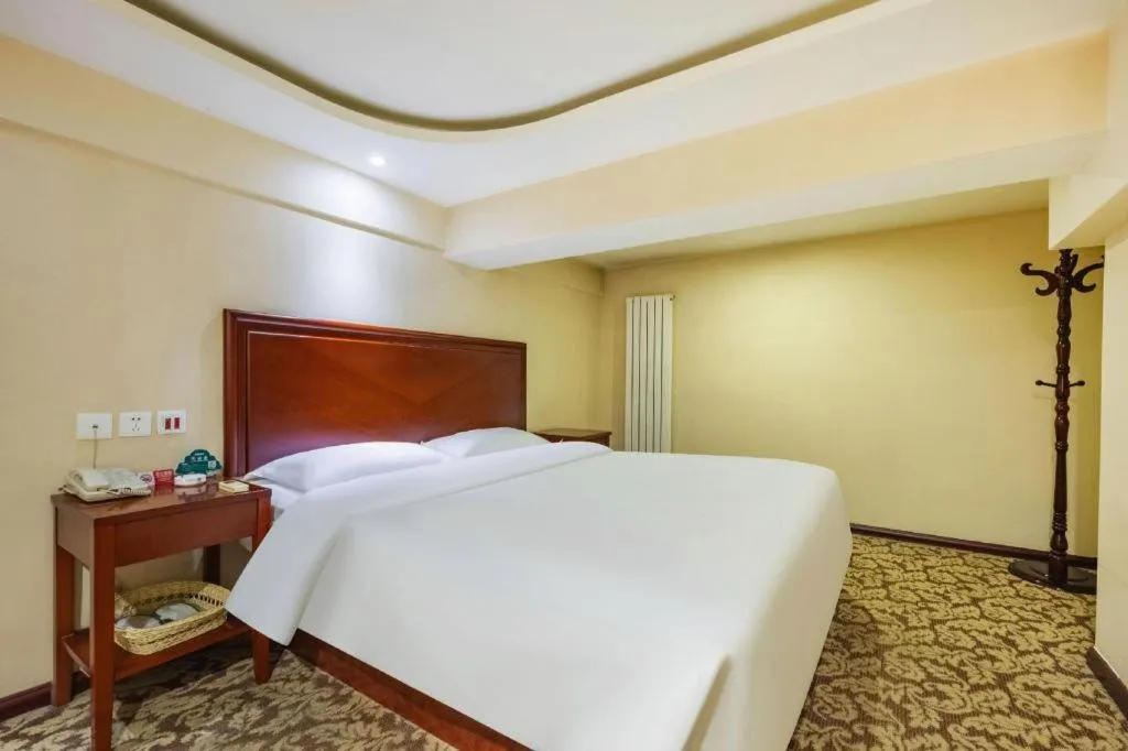 Bed in GreenTree Inn Tianjin JinNan ShuangLin Metro Station Express Hotel