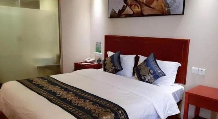 Bed in GreenTree Inn Tianjin JinNan ShuangLin Metro Station Express Hotel