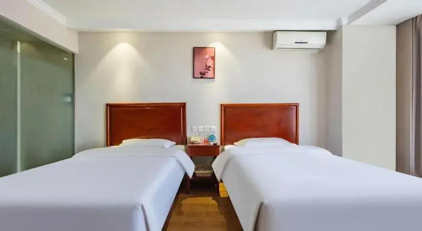 Bed in GreenTree Inn Tianjin JinNan ShuangLin Metro Station Express Hotel Bed in GreenTree Inn Tianjin JinNan ShuangLin Metro Station Express Hotel