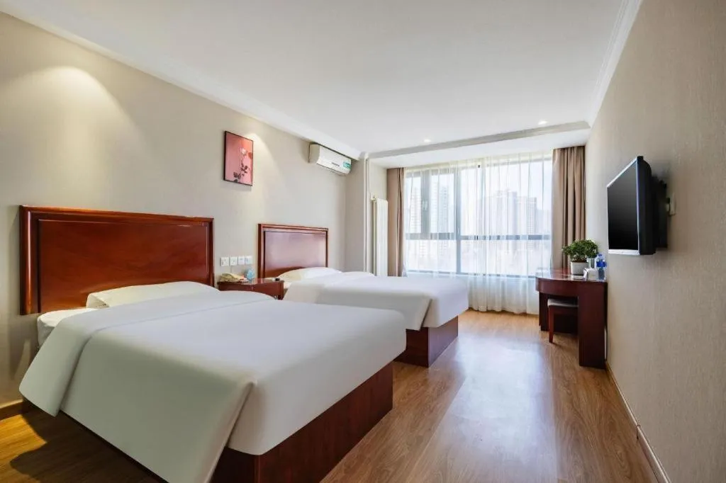 Bed in GreenTree Inn Tianjin JinNan ShuangLin Metro Station Express Hotel