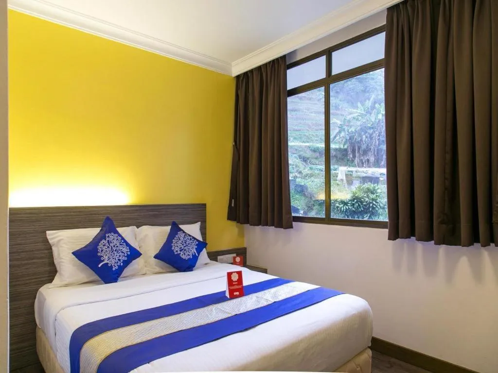 Bed in OYO 229 Parkland Hotel