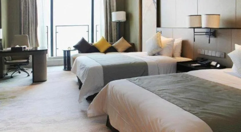 Bed in Golden Eagle Summit Hotel Kunshan