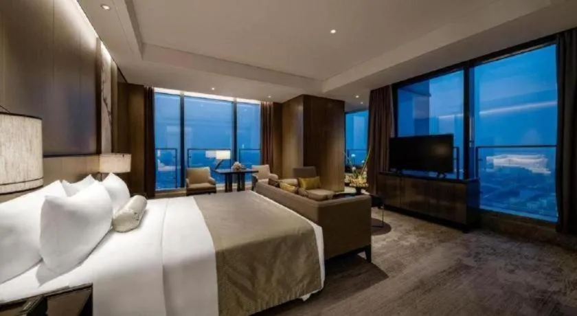 Bed in Golden Eagle Summit Hotel Kunshan