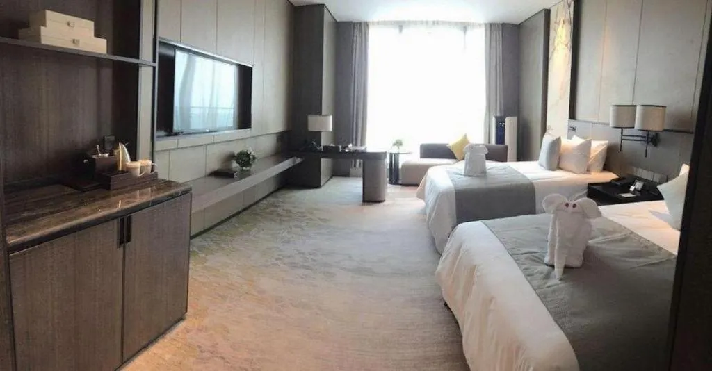Bed in Golden Eagle Summit Hotel Kunshan