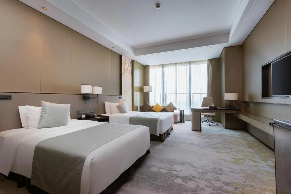 Bed in Golden Eagle Summit Hotel Kunshan
