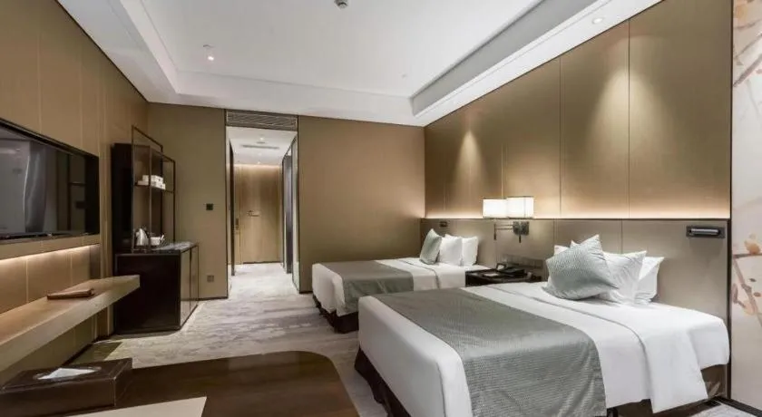 Bed in Golden Eagle Summit Hotel Kunshan