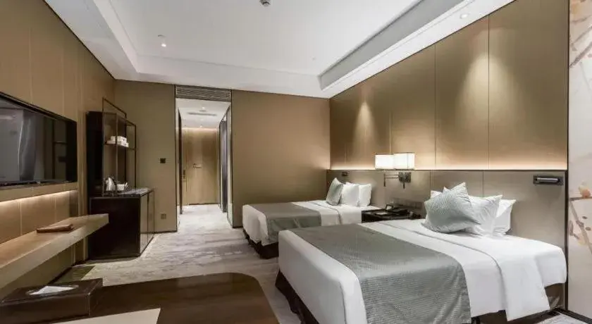 Bed in Golden Eagle Summit Hotel Kunshan Bed in Golden Eagle Summit Hotel Kunshan