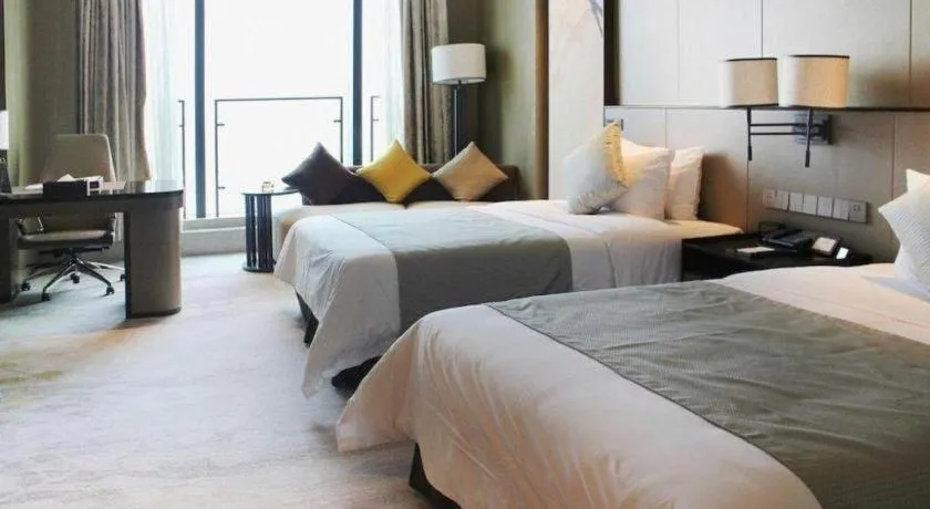 Bed in Golden Eagle Summit Hotel Kunshan