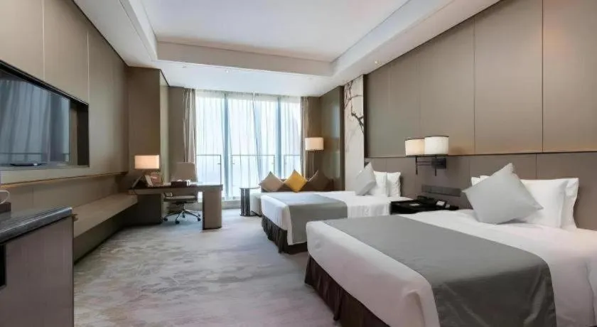 Bed in Golden Eagle Summit Hotel Kunshan