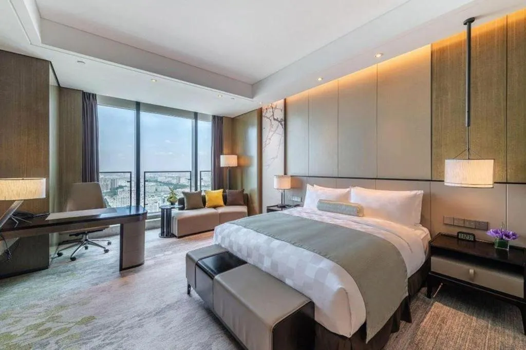 Bed in Golden Eagle Summit Hotel Kunshan