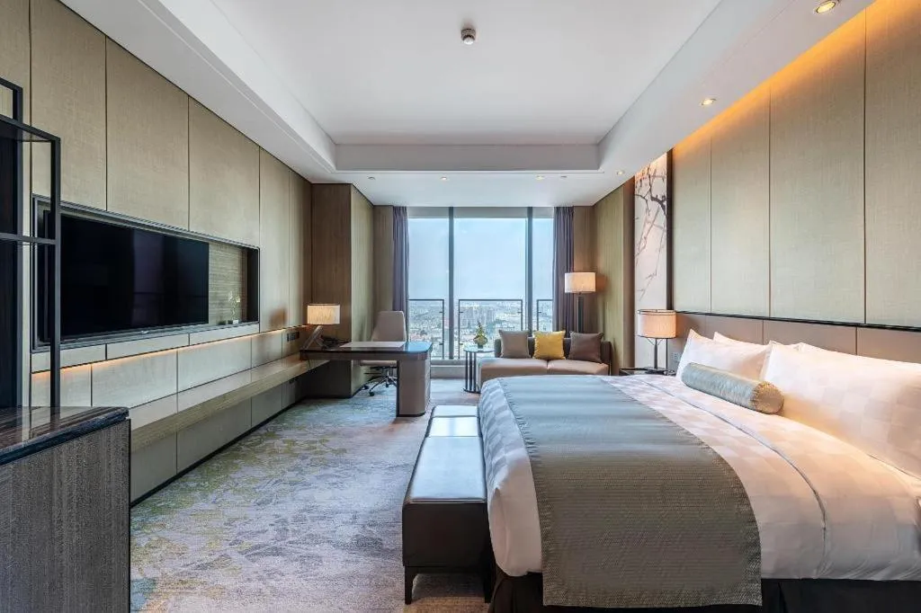 Bed in Golden Eagle Summit Hotel Kunshan