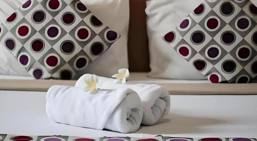 Bed in MANDARI HOTEL SINGARAJA