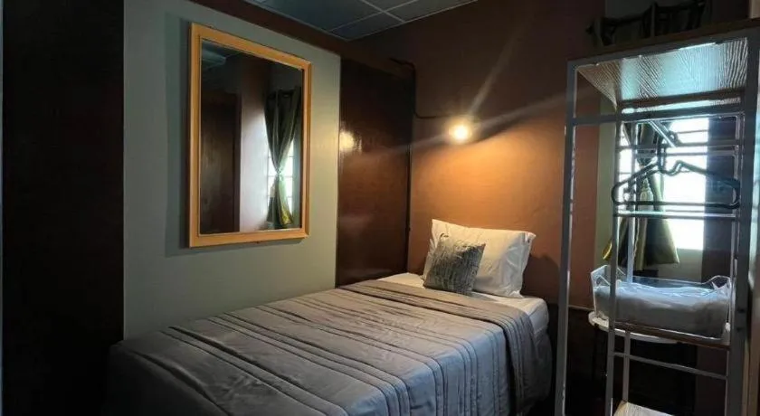 Bed in Nora Bukit Hotel