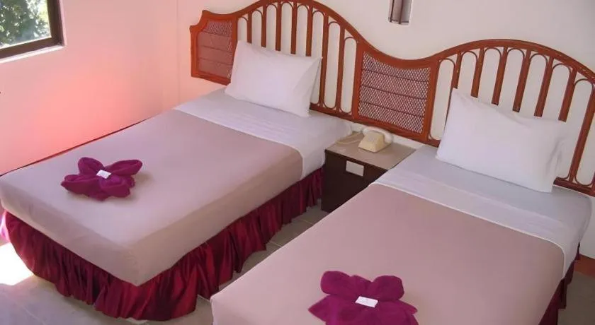 Bed in Nora Bukit Hotel