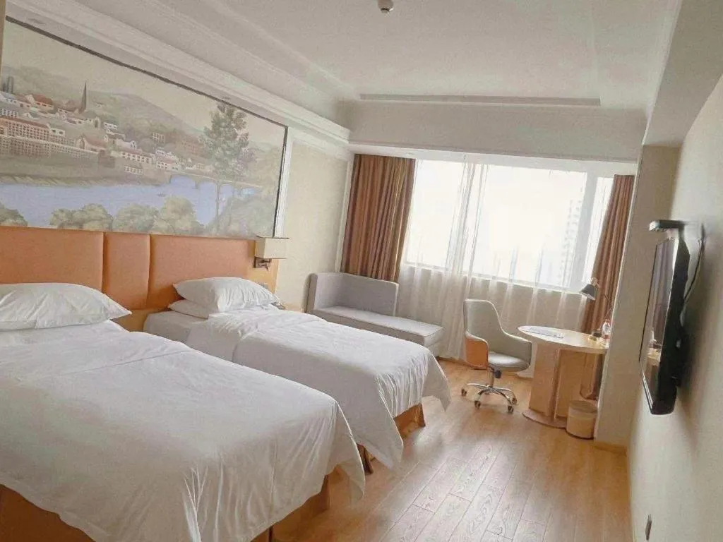 Bed in Vienna Hotel Jiangsu Danyang Railway Station
