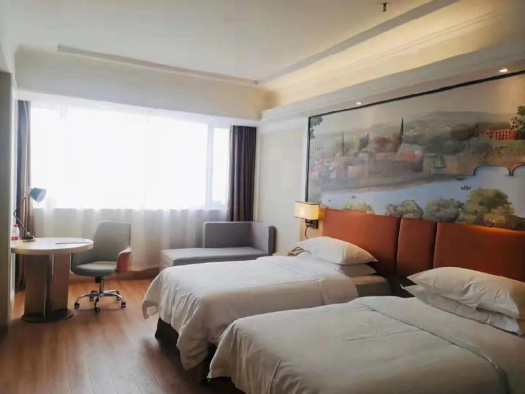 Bed in Vienna Hotel Jiangsu Danyang Railway Station