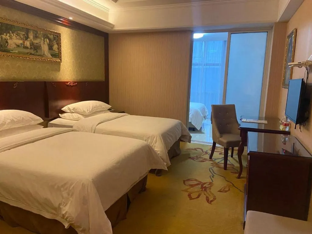 Bed in Vienna Hotel Jiangsu Danyang Railway Station