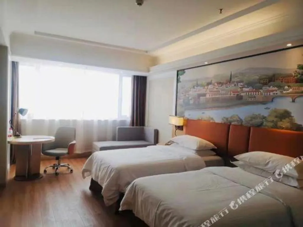 Bed in Vienna Hotel Jiangsu Danyang Railway Station