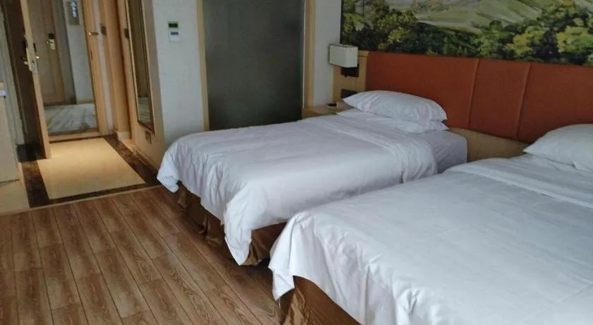 Bed in Vienna Hotel Jiangsu Danyang Railway Station