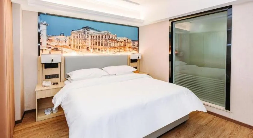 Bed in Vienna Hotel Yangzhou Outlets Plaza He Garden