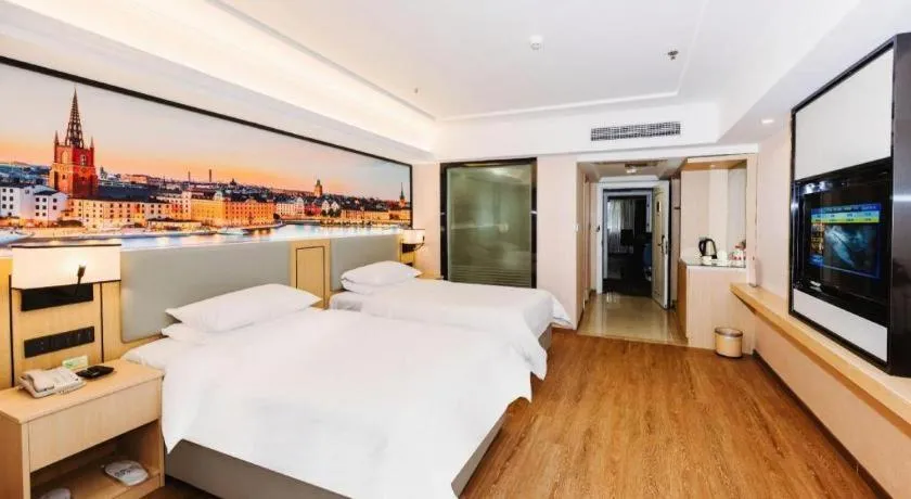 Bed in Vienna Hotel Yangzhou Outlets Plaza He Garden