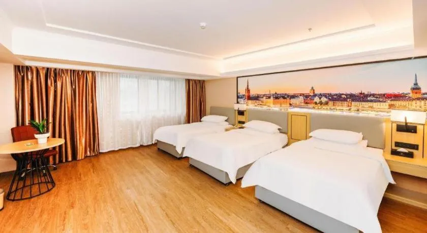 Bed in Vienna Hotel Yangzhou Outlets Plaza He Garden