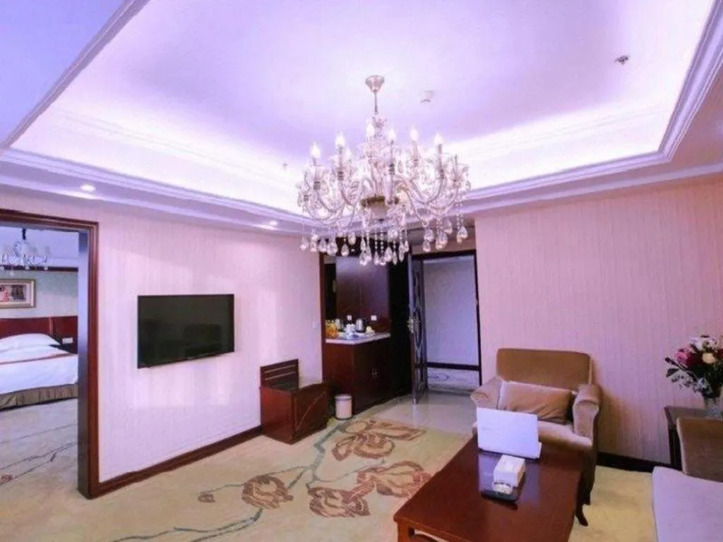 Bed in Vienna Hotel Yangzhou Outlets Plaza He Garden