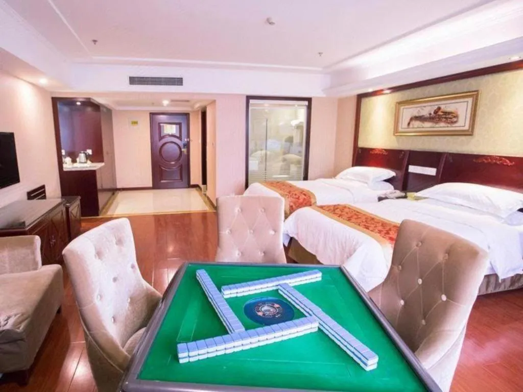 Bed in Vienna Hotel Yangzhou Outlets Plaza He Garden