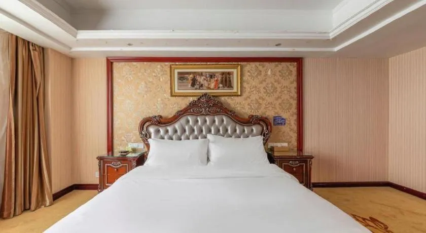 Bed in Vienna Hotel Yangzhou Outlets Plaza He Garden