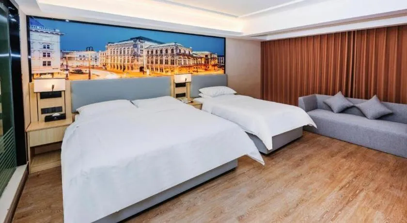 Bed in Vienna Hotel Yangzhou Outlets Plaza He Garden