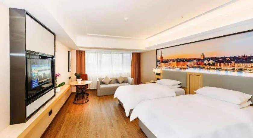 Bed in Vienna Hotel Yangzhou Outlets Plaza He Garden