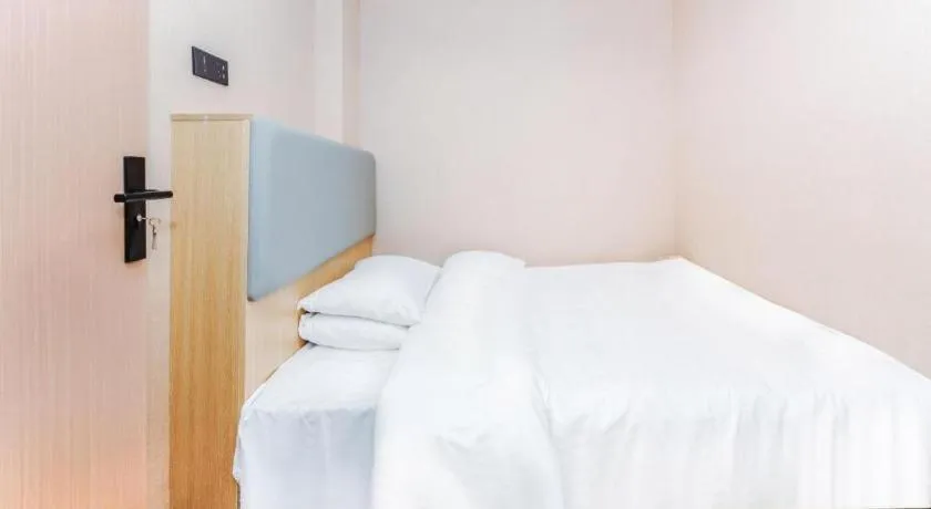 Bed in Vienna Hotel Yangzhou Outlets Plaza He Garden