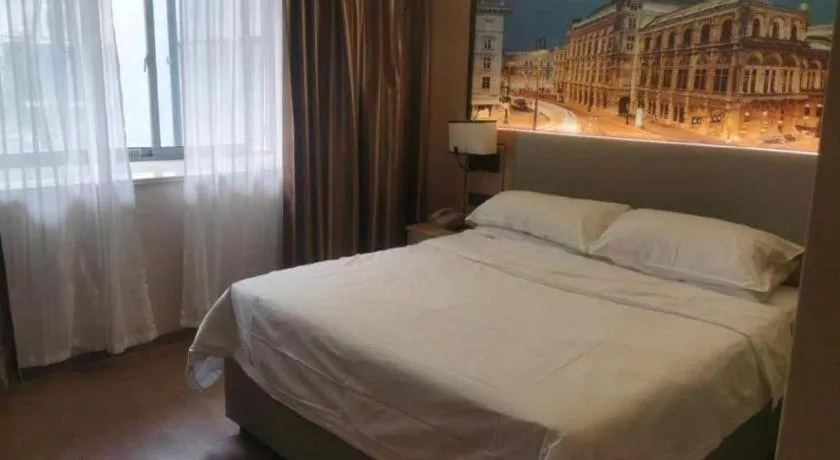 Bed in Vienna Hotel Yangzhou Outlets Plaza He Garden