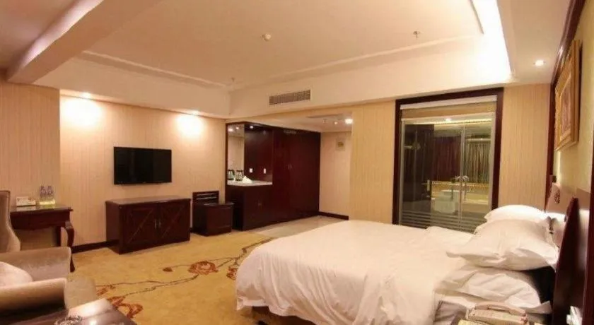 Bed in Vienna Hotel Yangzhou Outlets Plaza He Garden