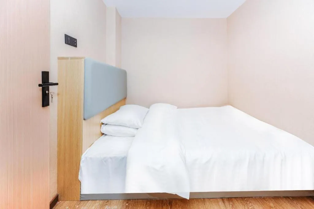 Bed in Vienna Hotel Yangzhou Outlets Plaza He Garden