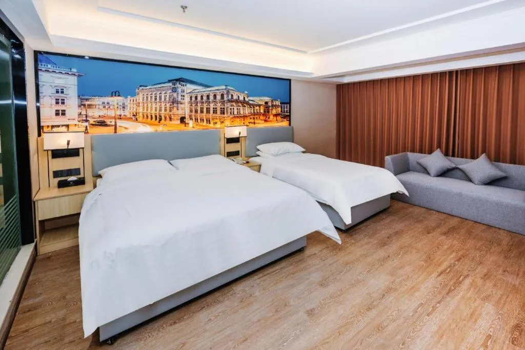 Bed in Vienna Hotel Yangzhou Outlets Plaza He Garden