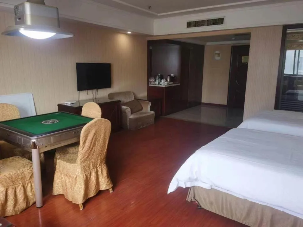 Bed in Vienna Hotel Yangzhou Outlets Plaza He Garden