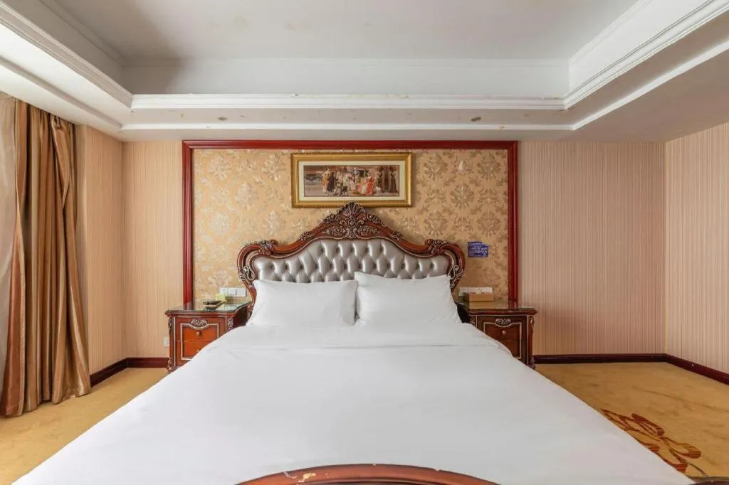 Bed in Vienna Hotel Yangzhou Outlets Plaza He Garden