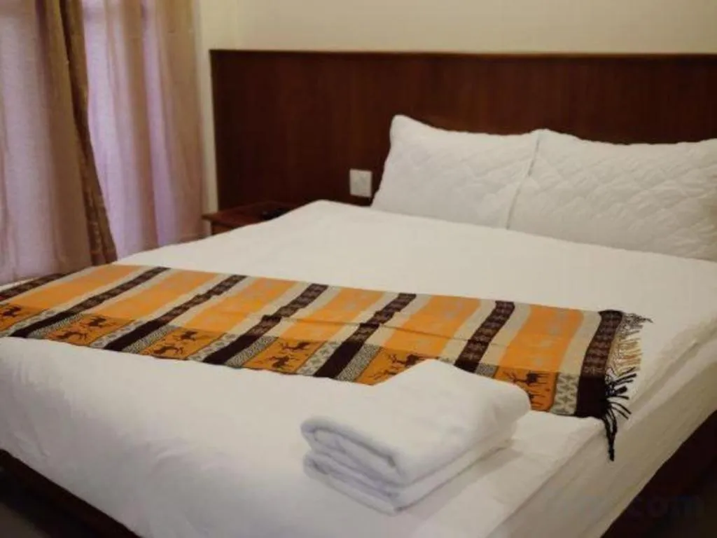 Bed in JITRA RESORT