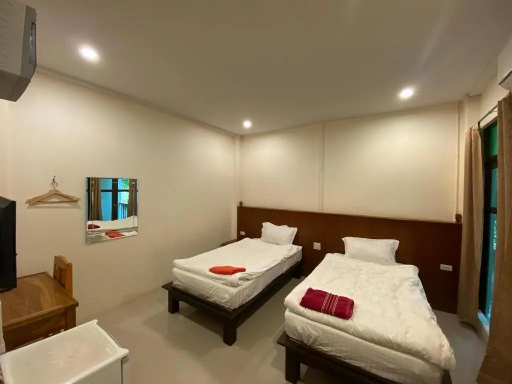 Bed in JITRA RESORT