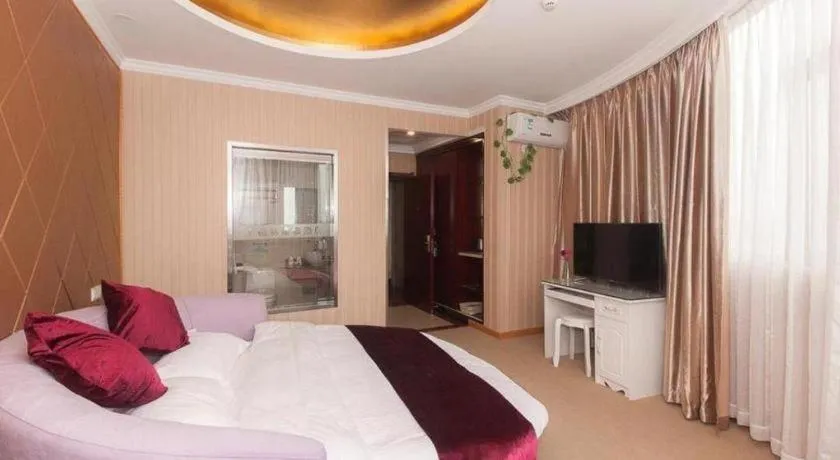 Bed in GreenTree Inn Wuxi Donggang Town Donghutang Shell Hotel