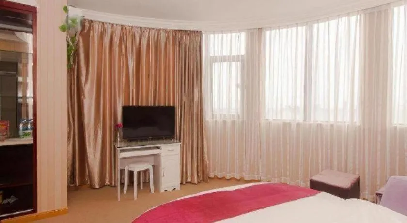 Bed in GreenTree Inn Wuxi Donggang Town Donghutang Shell Hotel