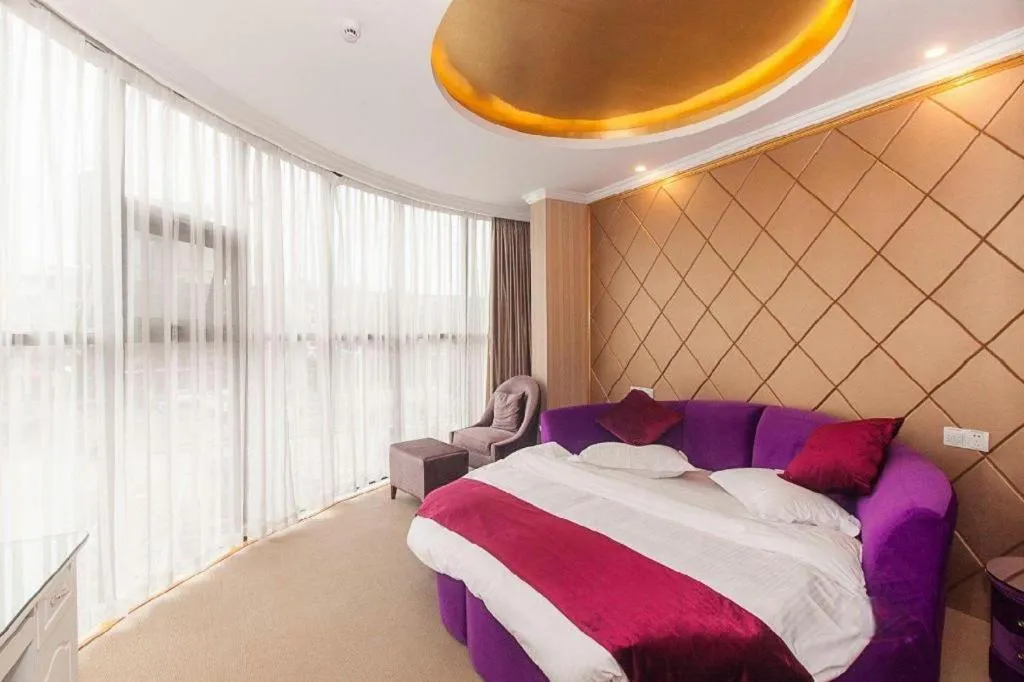 Bed in GreenTree Inn Wuxi Donggang Town Donghutang Shell Hotel