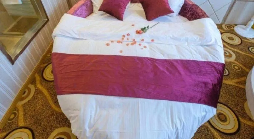 Bed in GreenTree Inn Wuxi Donggang Town Donghutang Shell Hotel