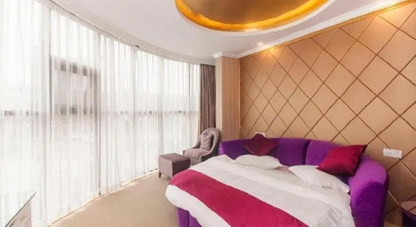 Bed in GreenTree Inn Wuxi Donggang Town Donghutang Shell Hotel