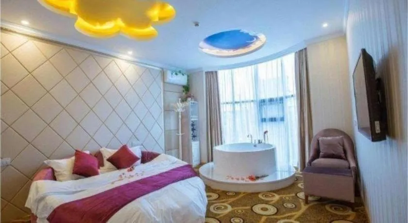 Bed in GreenTree Inn Wuxi Donggang Town Donghutang Shell Hotel