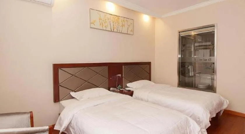 Bed in GreenTree Inn Wuxi Donggang Town Donghutang Shell Hotel
